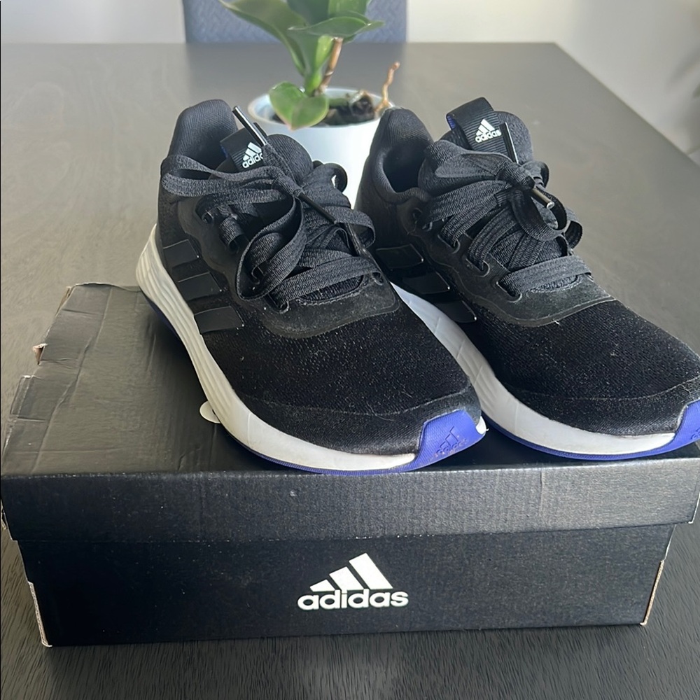 Adidas Black and White Sneakers with Blue Accents